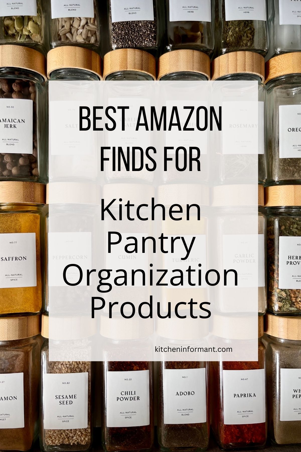 Neatly organized spice drawer with clear glass jars and bamboo lids, each labeled (Jamaican Jerk, Saffron, Sesame Seed, Chili Powder, Adobo, Paprika, Oregano, Rosemary, Garlic Powder). Text overlay: “BEST AMAZON FINDS FOR Kitchen Pantry Organization Products” and “kitcheninformant.com”.
